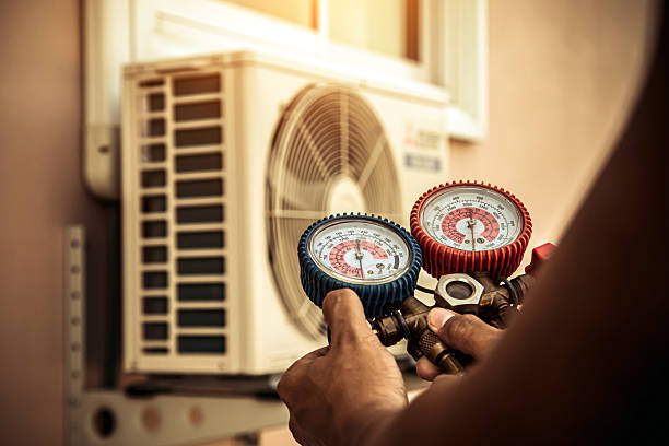 Professional Heat Pump Repair technician working in Hudson, IN